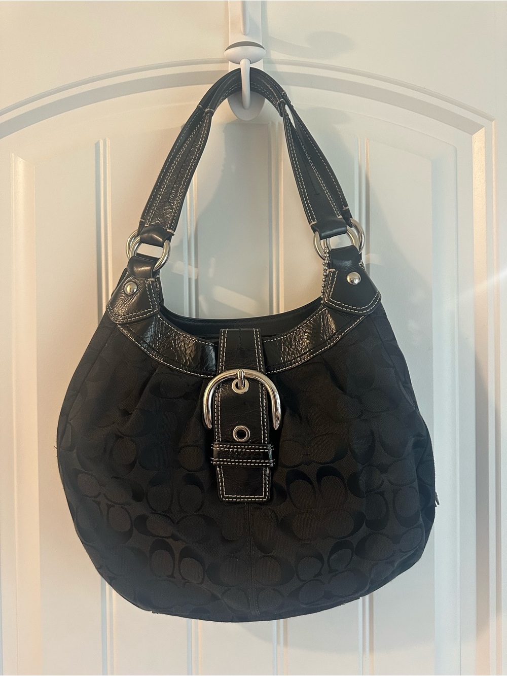 Coach Black SoHo Lynn Signature Hobo Bag with Buckle Accent